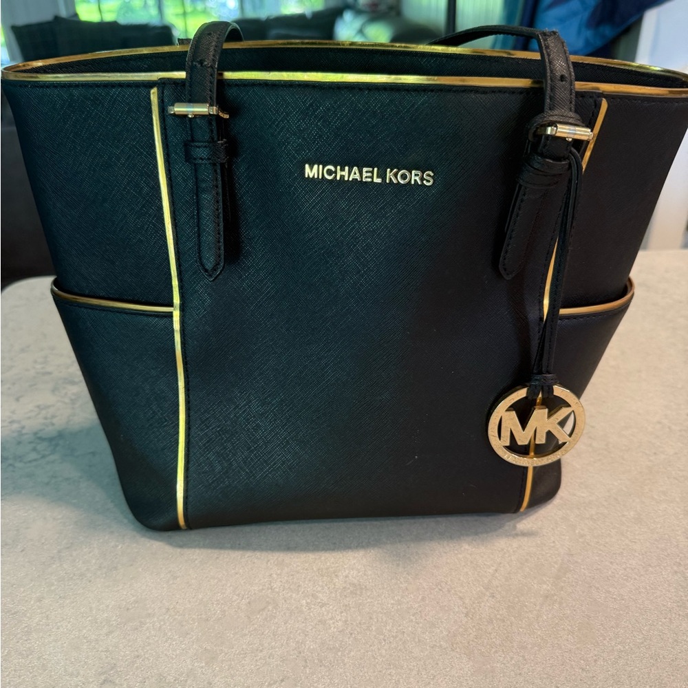 Michael Kors Black and Gold Tote with Structured Design
